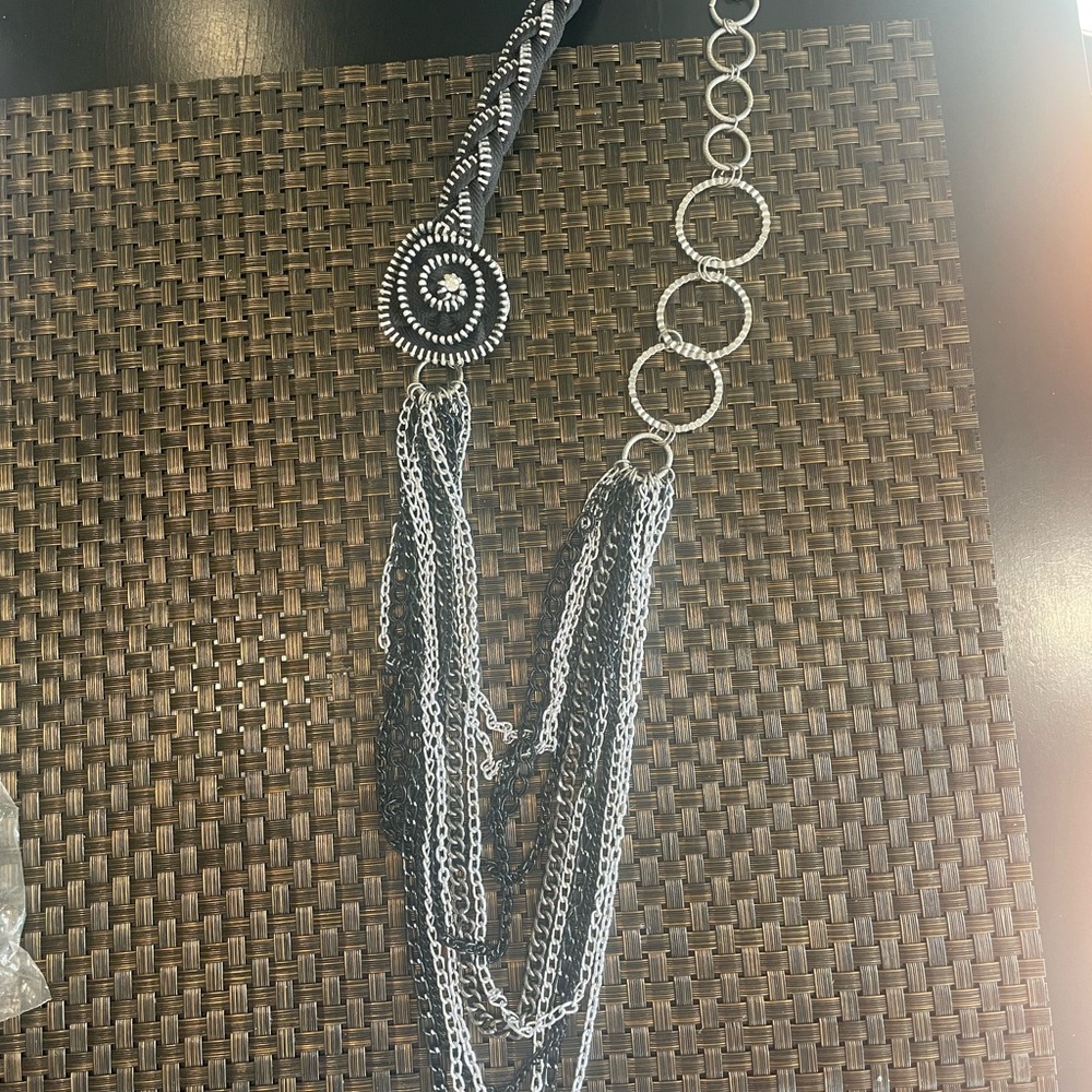 Cool black and silver necklace with rosette.